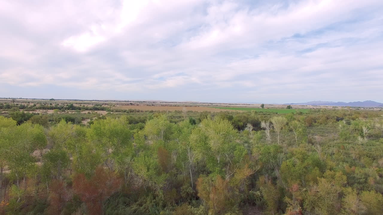 Aerial shot from ground level from US side of US-Mexico border.