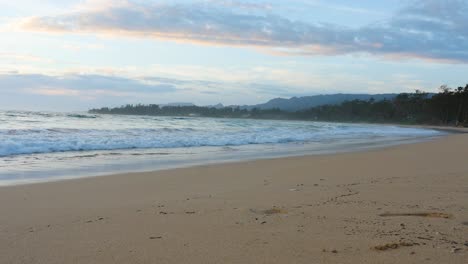 A-remote-beach-on-North-Shore-oahu-with-rough-surf-at-sunset