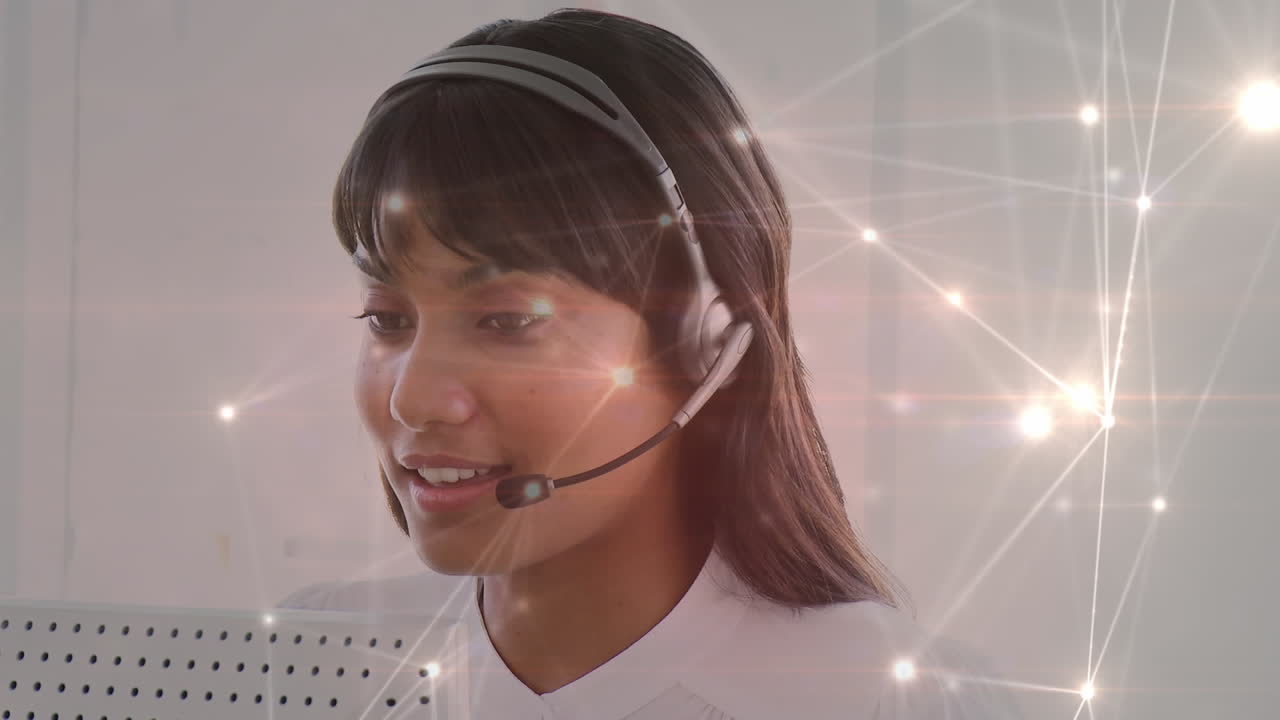 Animation of networks of connections over businesswoman using phone headsets