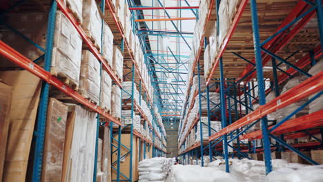 warehouse shelves with stacked goods and packages