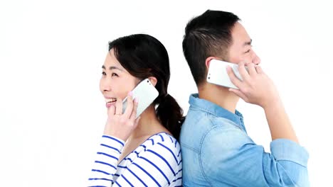 Couple-having-phone-calls