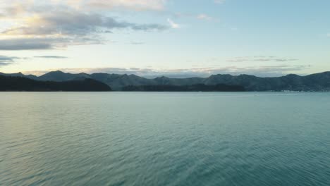 Drone-shot-of-geese-in-bay-as-sun-sets