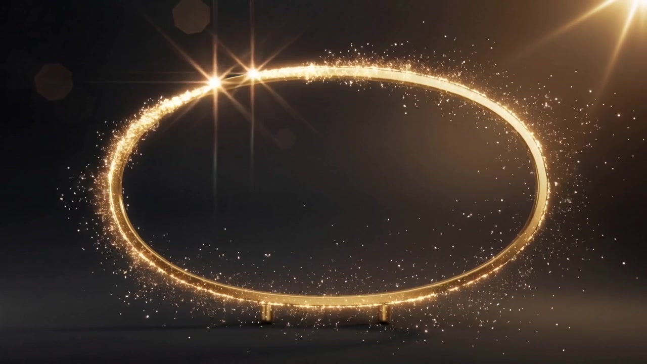 Punto luce scintillante che viaggia attorno a un anello ovale d'oro in uno studio, mentre appare un bagliore a stella sulla destra.