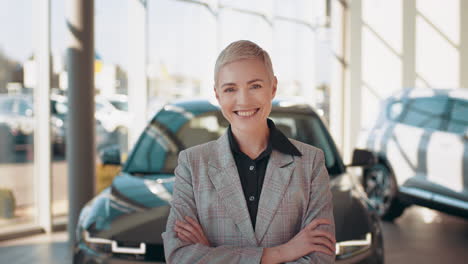 confident businesswoman in car showroom