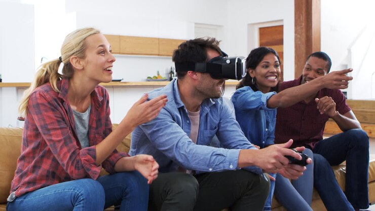 Friends Playing Computer Game With Virtual Reality Headset
