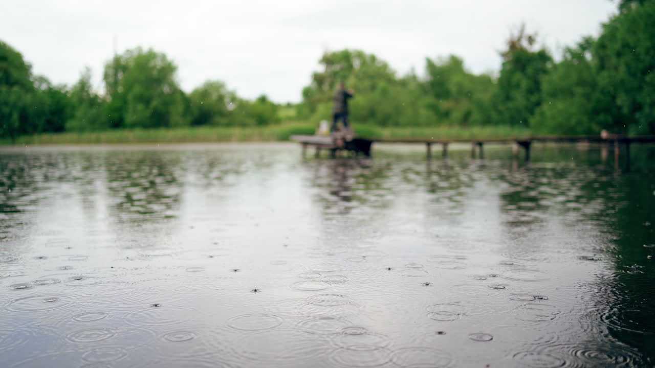 the man fishing on old wooden pier
