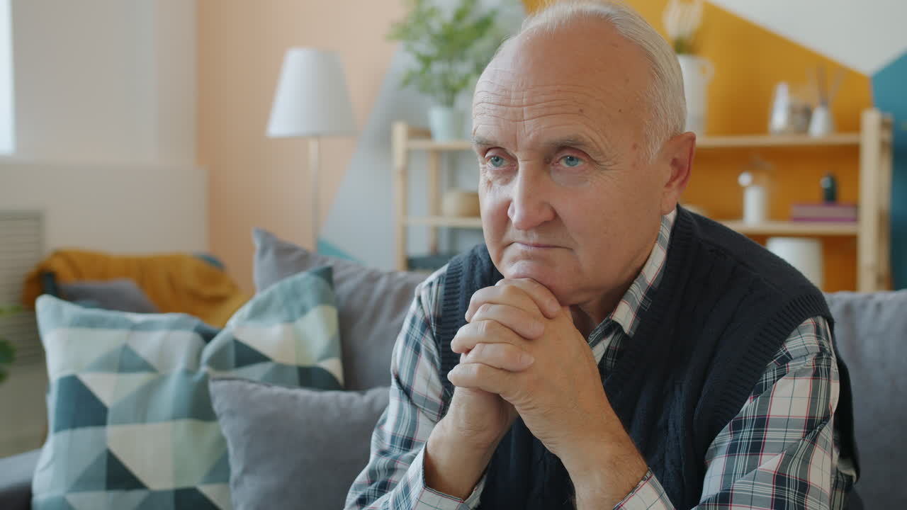 Senior Man Sitting on Couch