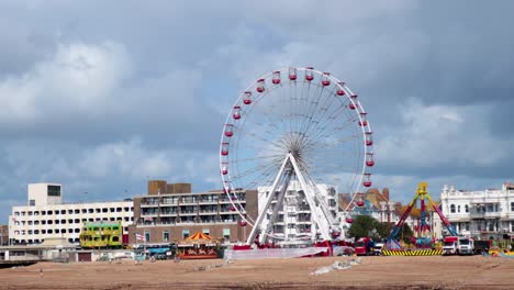 ferris wheel and merry-go-round by the seaside