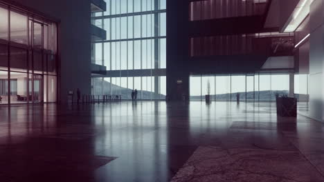 modern architectural lobby with large windows and distant figures
