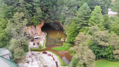 4K-Drone-Video-of-Mining-Train-and-Cave-at-Emerald-Village-near-Little-Switzerland,-NC-on-Summer-Day-2