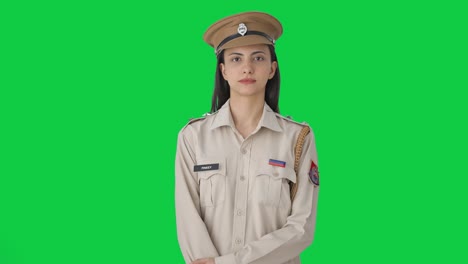 Indian-female-police-officer-looking-Green-screen