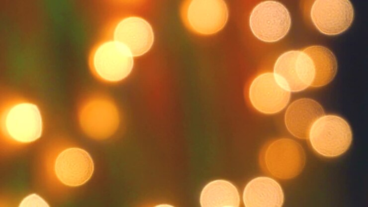 di movimento di luce bokeh lampeggiamento astratto sfocamento sullo sfondo. filmati 4k