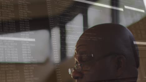 animation of data processing over african american businessman in office