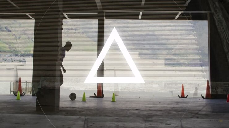 Man entering bay, near cones, picking ball, dribbling for sports while overlay pulsing over shadow