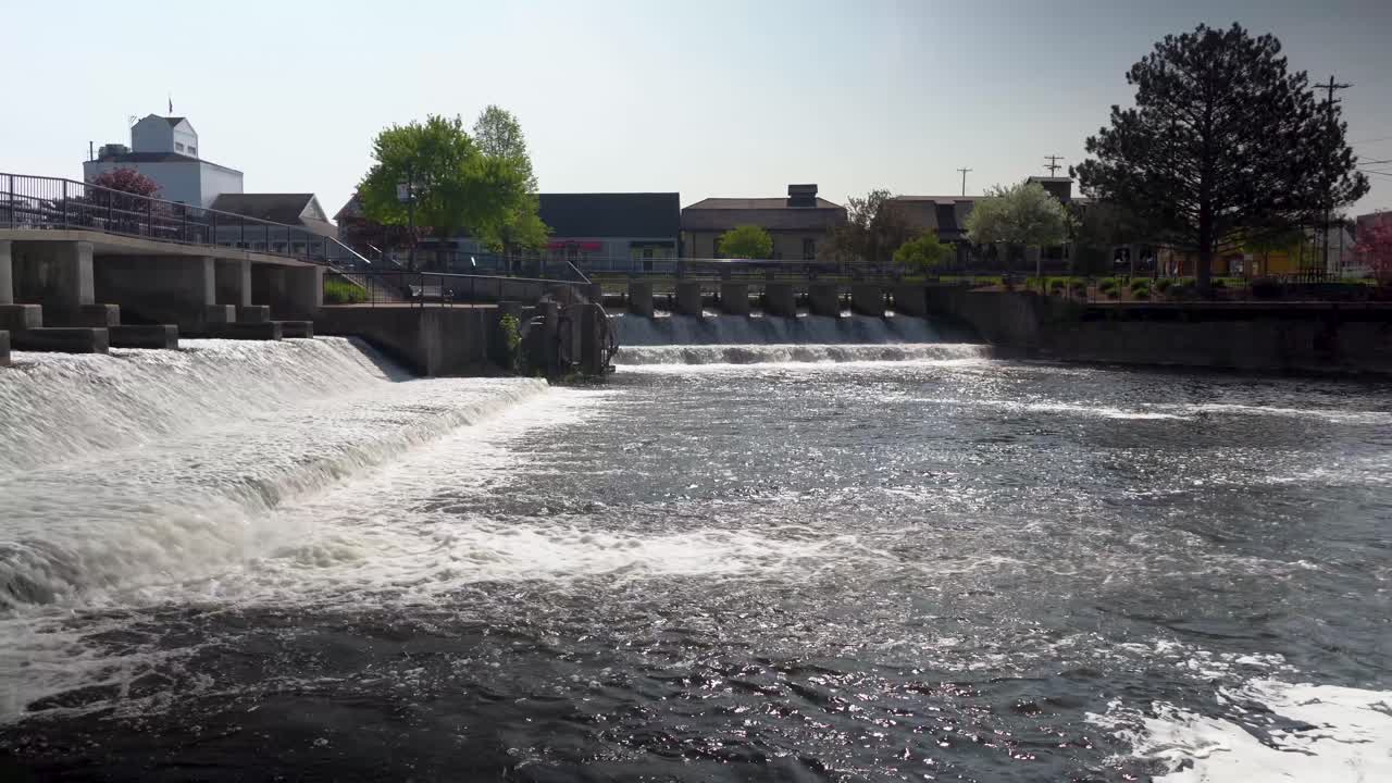 dam in rockford michigan waterfall flowing water