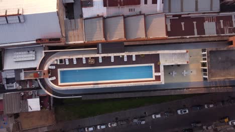 swimming pool on rooftop of luxury building