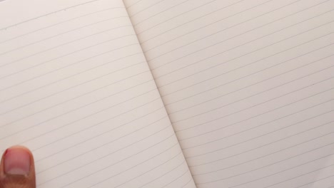 open notebook with lined paper