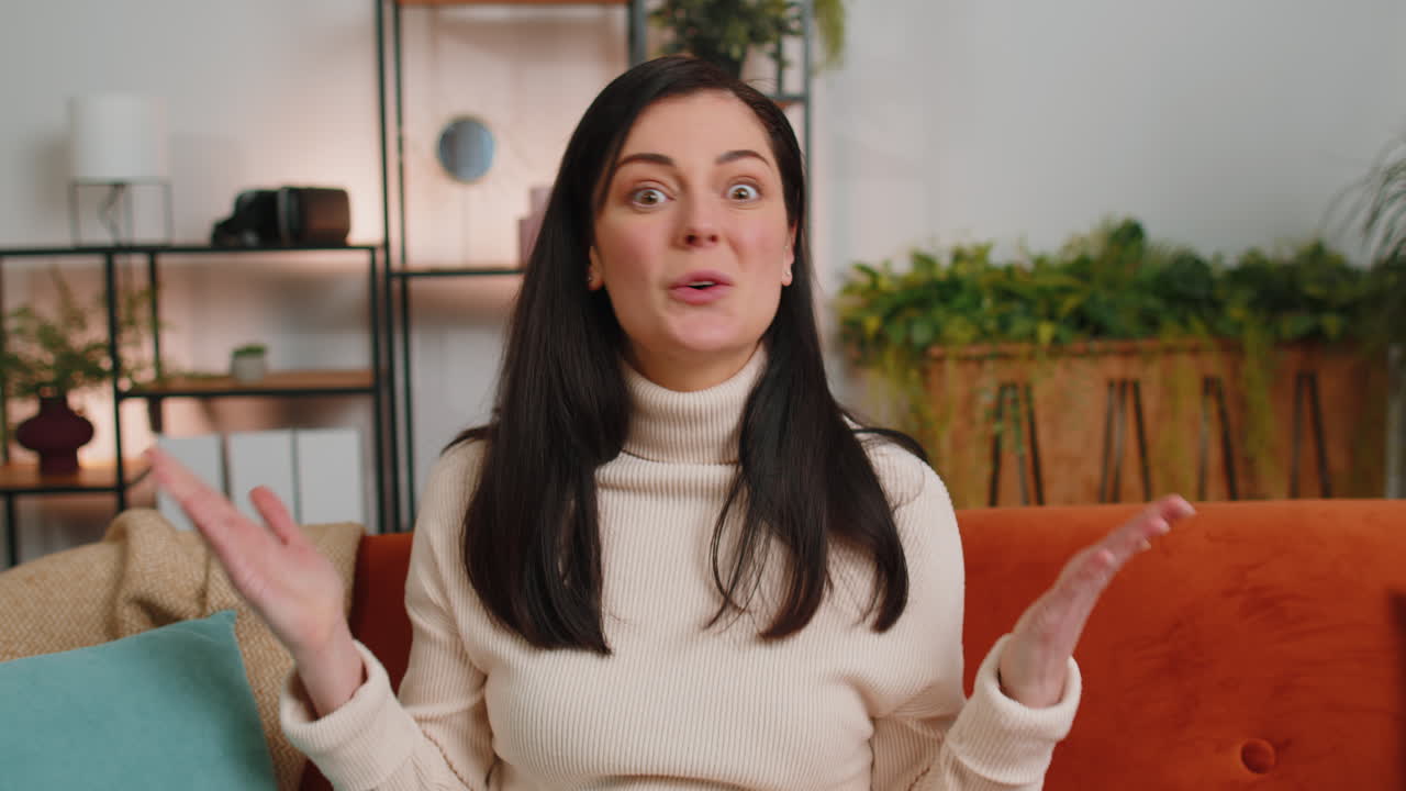 Surprised young woman shocked by sudden victory good win news celebrating lottery jackpot luck