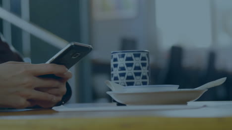 animation of graphs and trading board over caucasian man chatting using cellphone in cafes