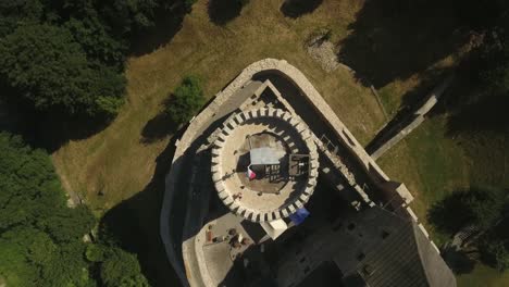 bird eye view of old castel tower with tourists 4k