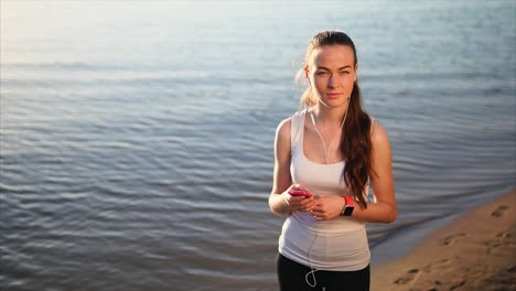 woman enjoying a workout by the river