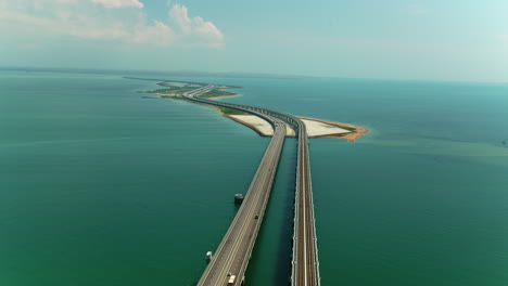 aerial view of a long bridge over water