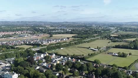 aerial of the m5 motorway in the flat rural devon landscape around exeter