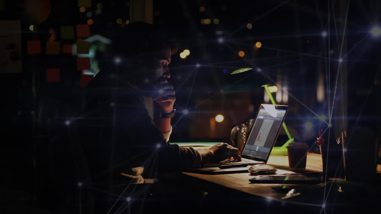 Network connections lines with businessman typing on laptop