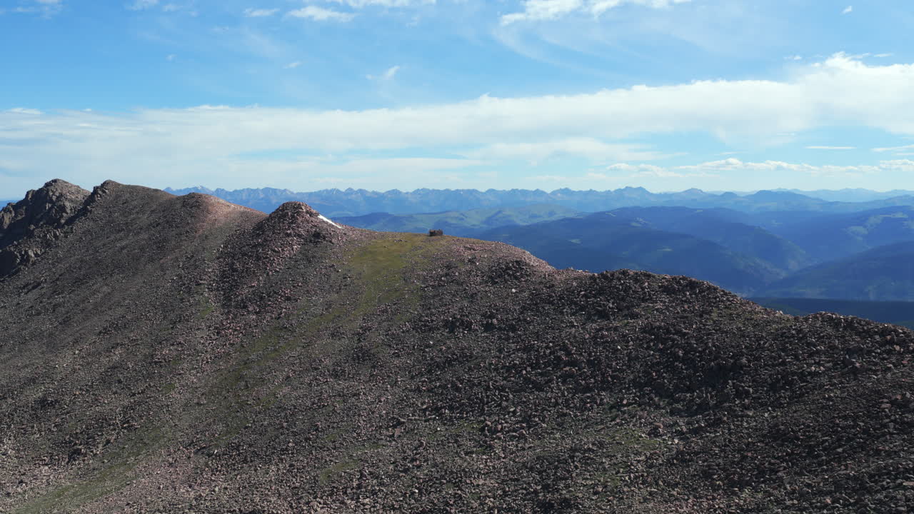Notch Mountain Shelter morning camping Halo Ridge Gore Range Vail Minturn Redcliff aerial drone Colorado sunny blue sky summer Mount Holy Cross peak Wilderness Sawatch Range Rocky Mountains forward
