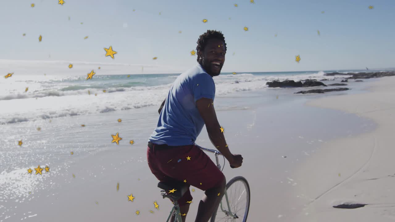 Cyclist pedaling green bike on beach travel sensing behind, turning to smile as yellow stars float