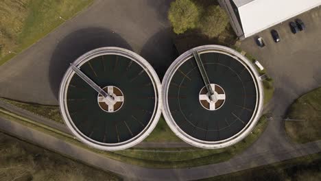 the round pools of a fresh water treatment plant viewed from above