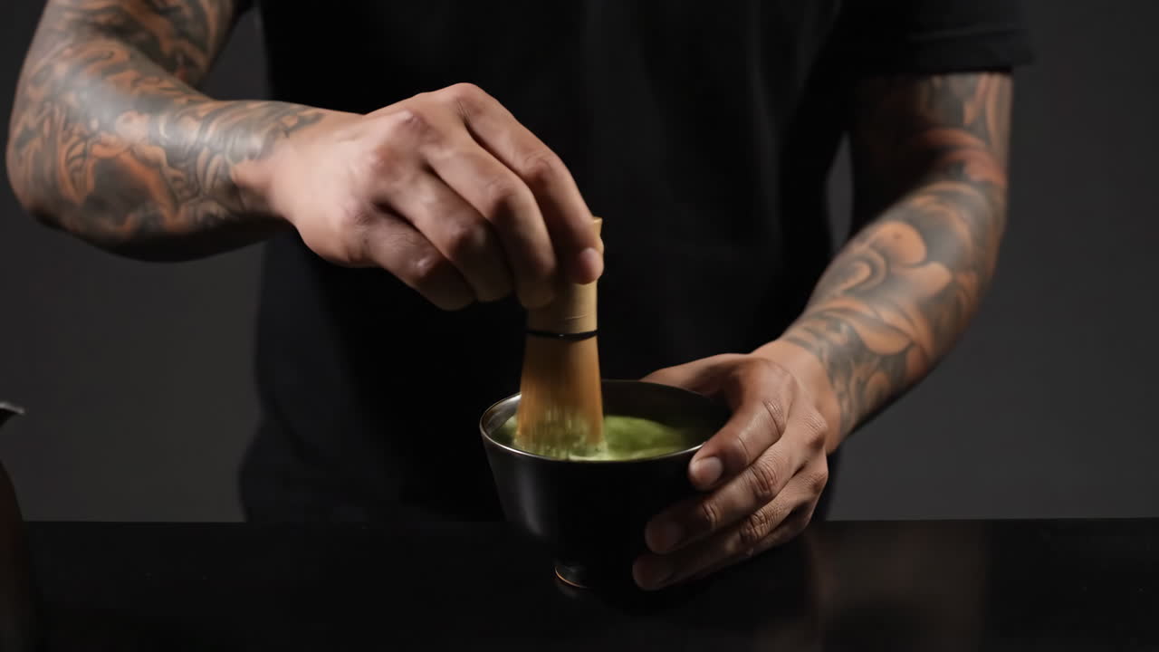 Preparing traditional matcha tea