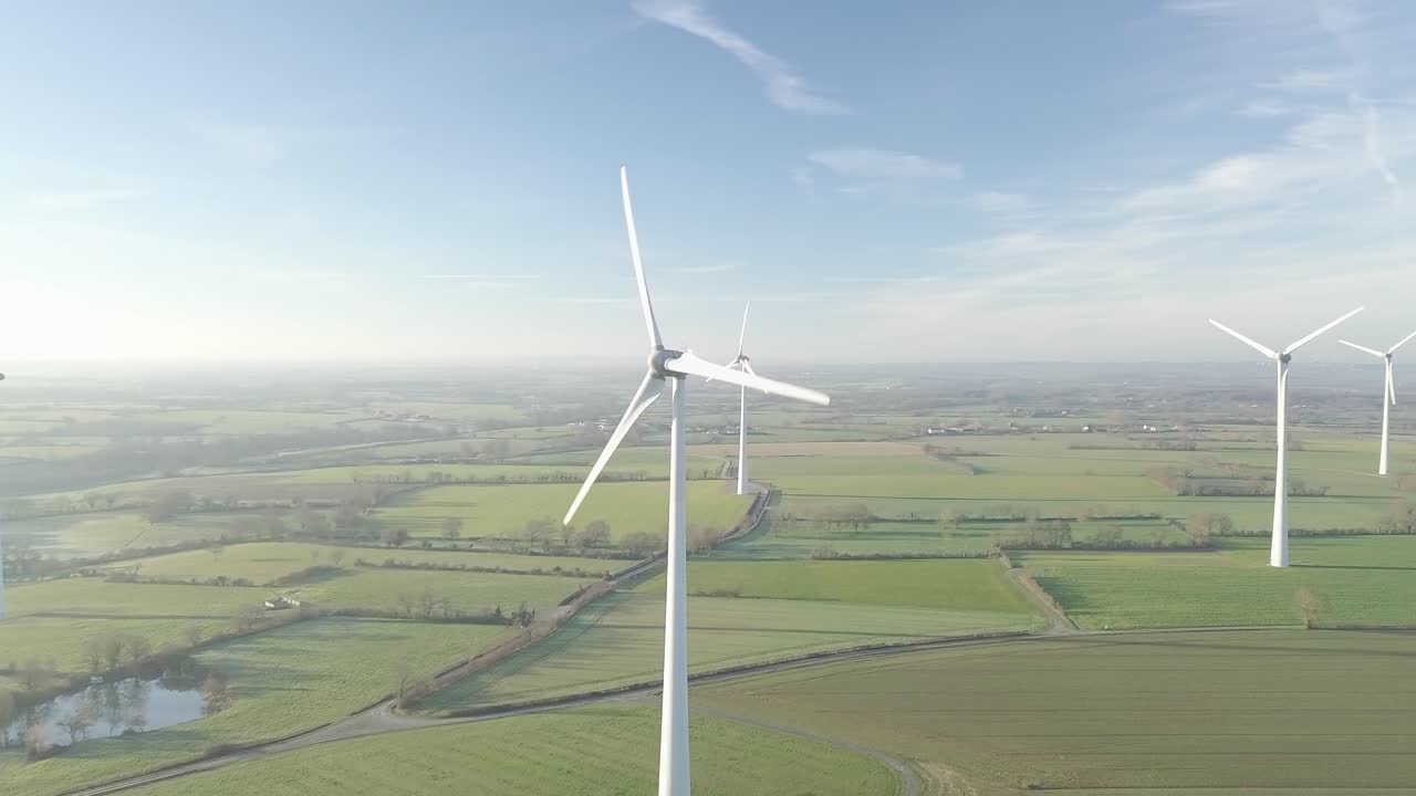Aerial view of a windturbine countryside in the rising sun 2