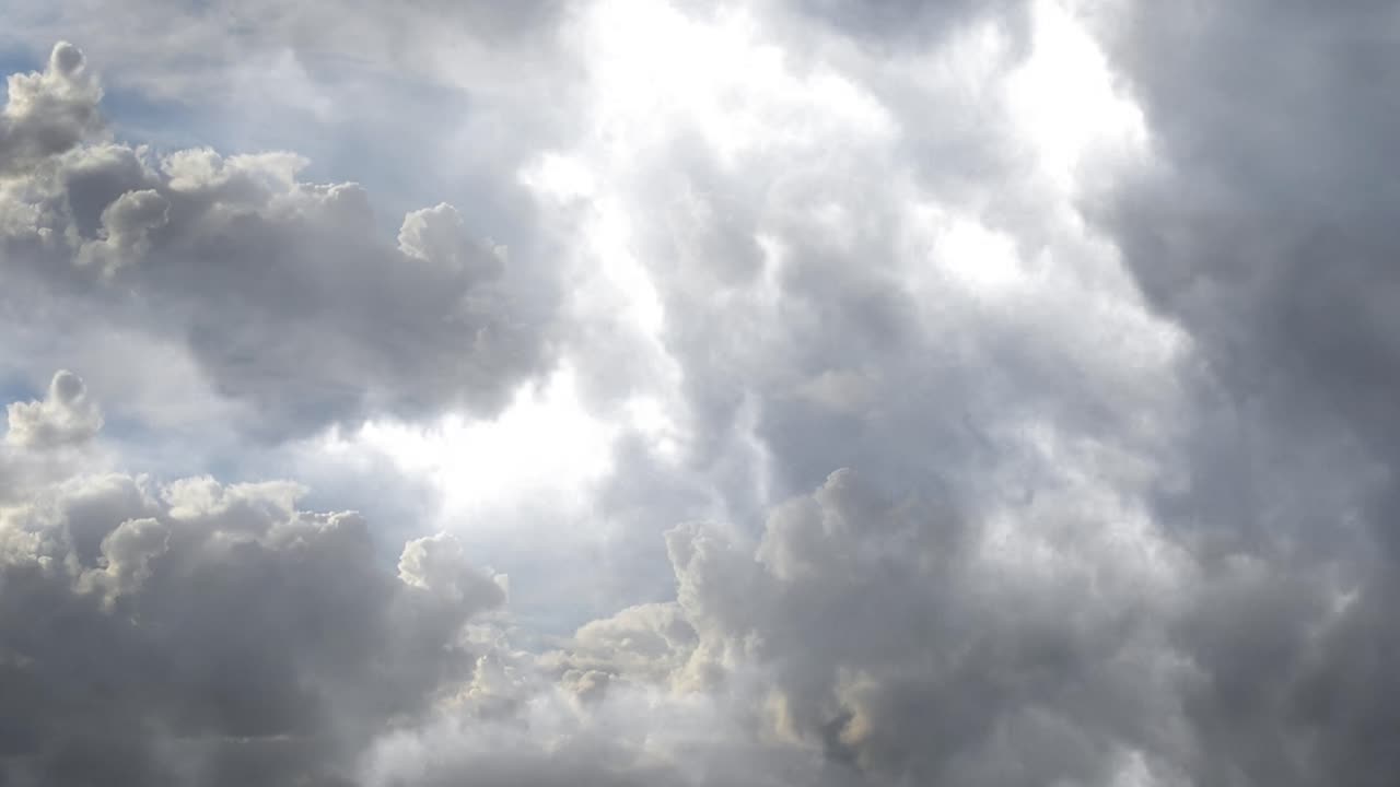 dark cumulonimbus clouds cover the sky, thunderstorm