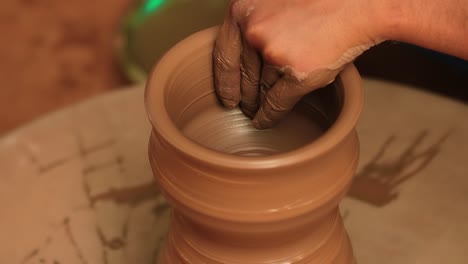 potter at work makes ceramic dishes. india, rajasthan.