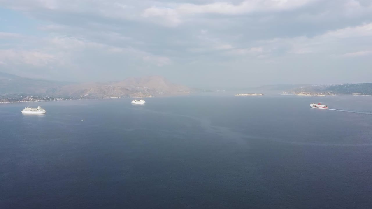 aerial drone view of souda bay chania crete with ferry and cruise ships