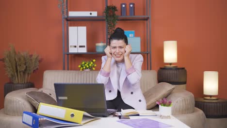 Home-office-worker-young-woman-getting-bad-news-from-camera.