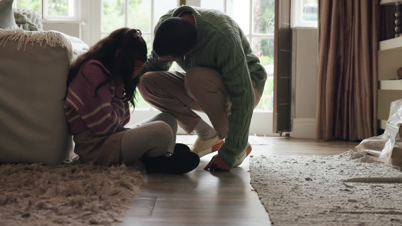 Father comforting his daughter