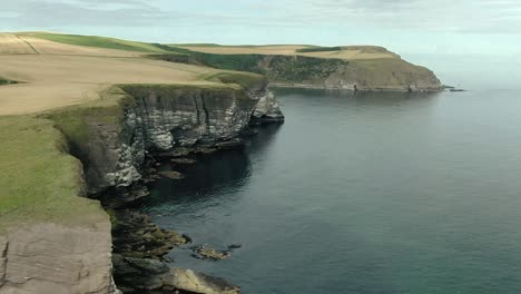 aerial view of the aberdeenshire coastline at cullykhan on a sunny, summer day