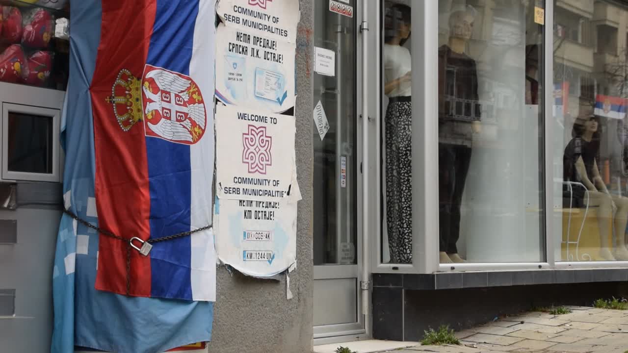 Nationalistic posters and a Serbian flag in north Mitrociva in Kosovo.