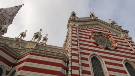 Church-El-Carmen-in-Bogota,-Colombia,-low-angle-panning-shot