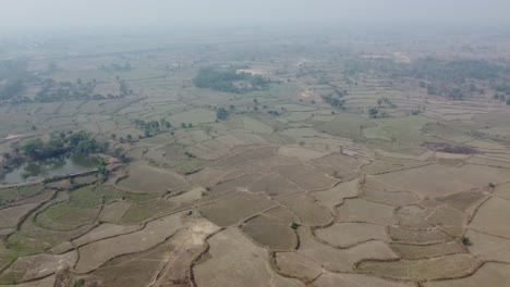 Drone-video-shot-of-vast-fields-after-harvest