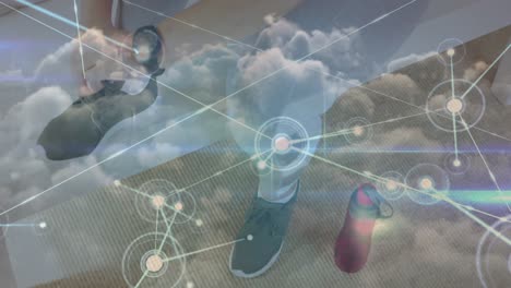 Animation-of-network-of-connections-over-woman-tying-shoe-laces-and-clouds
