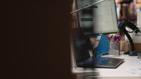vertical video asian warehouse worker uses ai virtual assistant to help manage inventory