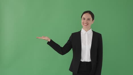 businesswoman presenting copy space on her palm