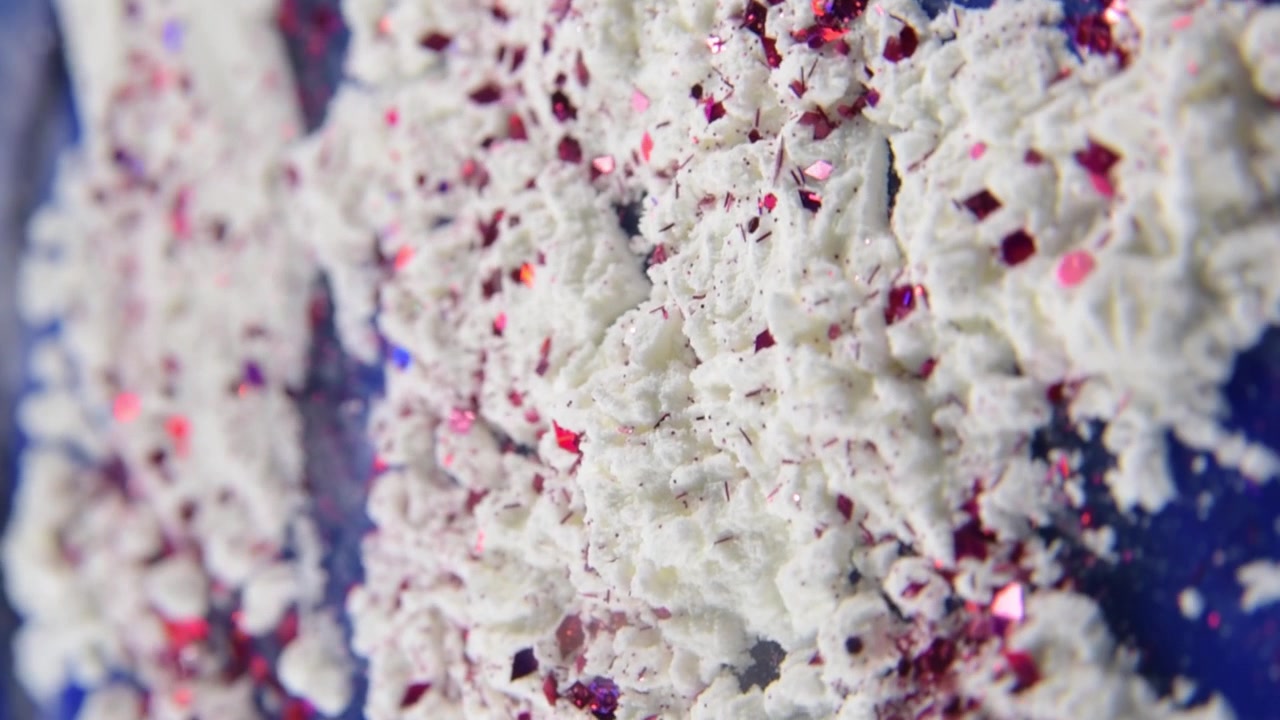 Abstract texture with white powder and glitter