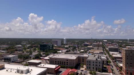 drone shot over historic downtown pensacola in florida on a partly cloudy and sunny day-4