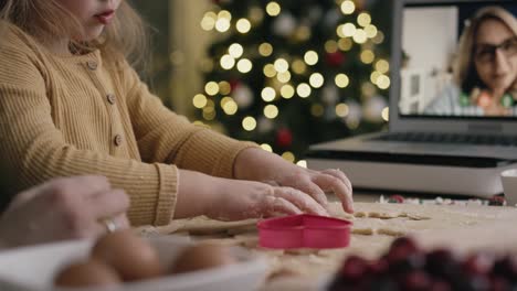 Night-video-of-family-baking-while-having-video-conference