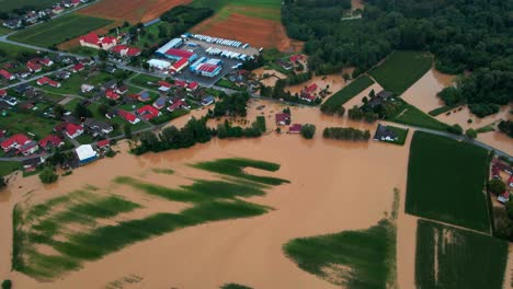 horrific aerial 4k drone footage of houses in podravje, slovenia, during august floods