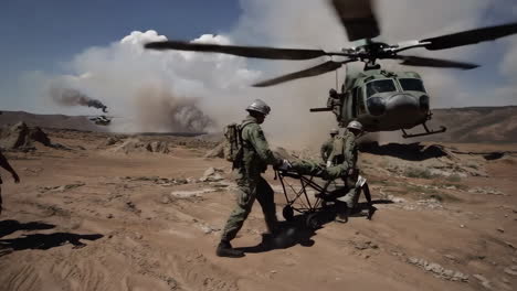 military helicopter rescue operation in a desert environment